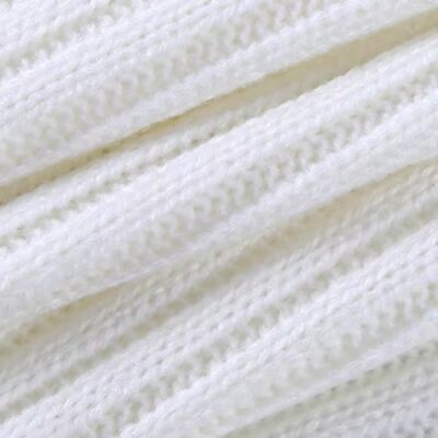 White knitted fabric texture detail.